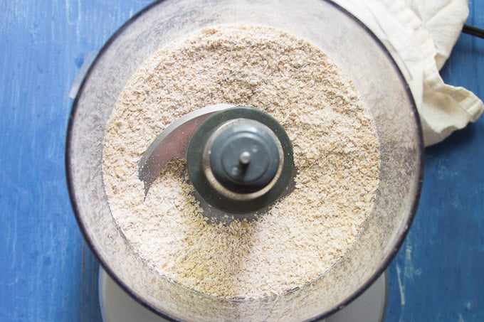 Oats Ground to a Powder in a Food Processor Bowl.