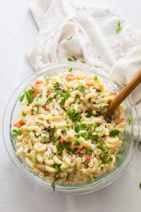 Vegan Macaroni Salad in a Large Bowl on White Background
