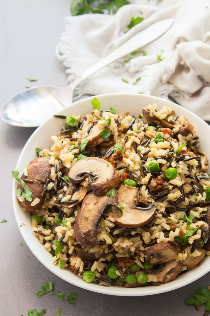 Bowl of Wild Rice Pilaf with Napkin and Spoon in the Background