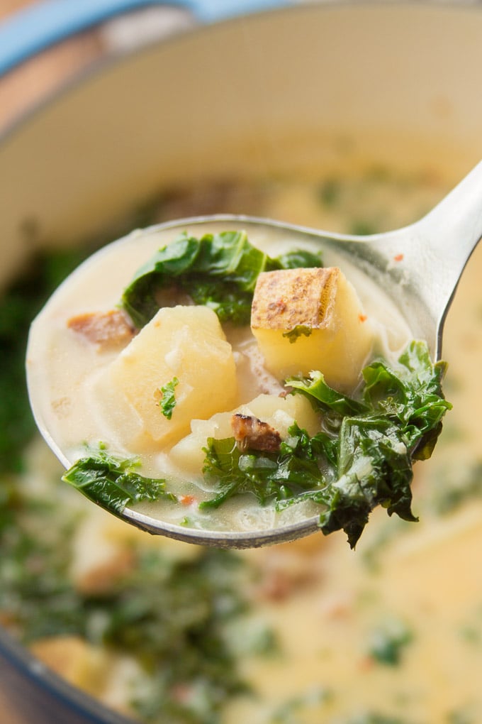 Close Up of a Ladle Full of Vegan Zuppa Toscana
