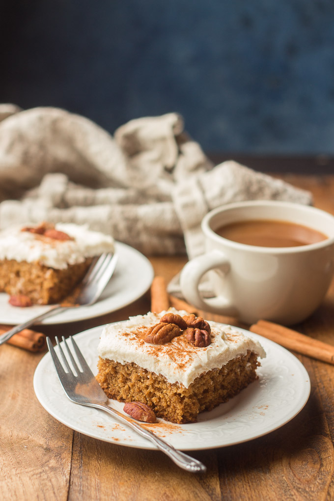 Two Plates of Spice Cake, Coffee Cup and Napkin on a Wooden Table