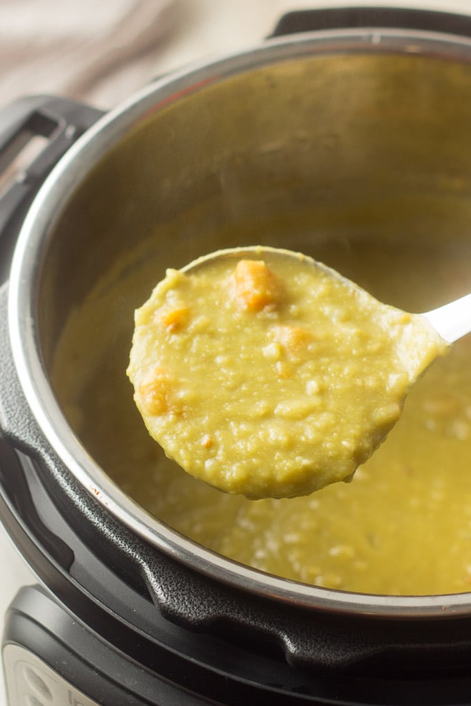 Ladle Drawing Vegetarian Split Pea Soup from an Instant Pot