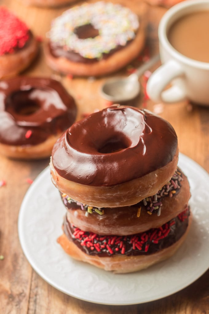 Stack of Three Vegan Doughnuts on a Plate