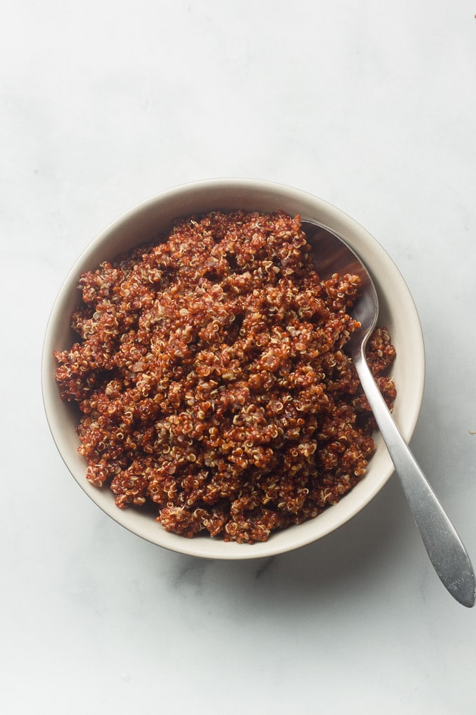 Bowl of Red Quinoa with a Spoon