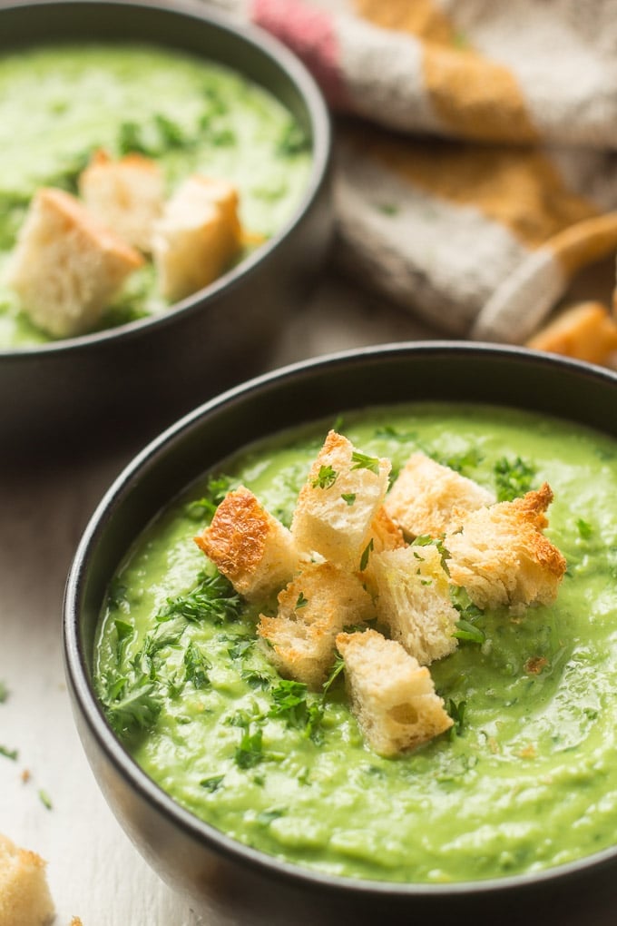 Close Up of Croutons on Top of a Bowl of Fresh Pea Soup