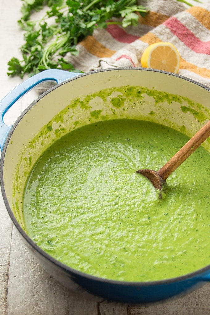 Pot of Fresh Pea Soup with Wooden Spoon