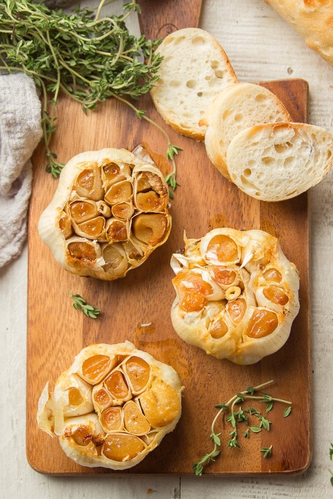 Cutting Board Set with Baguette Slices, Roasted Garlic and Thyme Sprigs