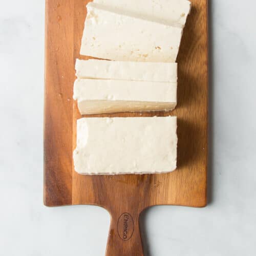 Sliced Block of Soft Tofu on a Cutting Board