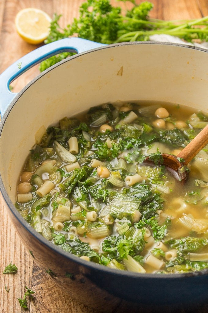 Pot of Escarole Soup with Wooden Spoon