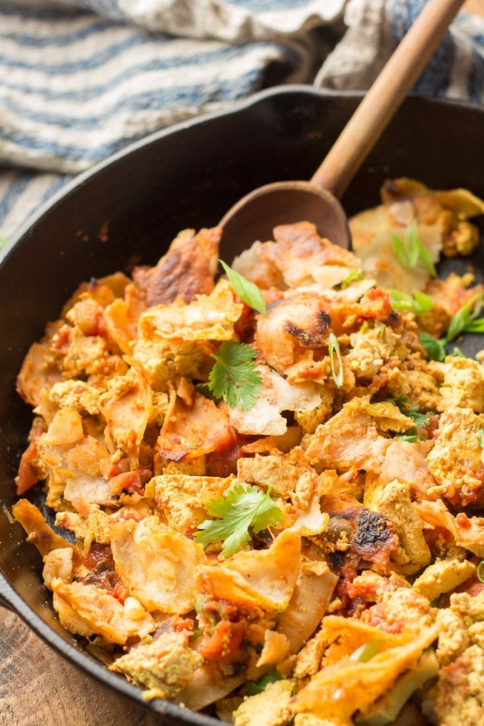 Close Up of Vegan Migas in a Skillet with Wooden Spoon