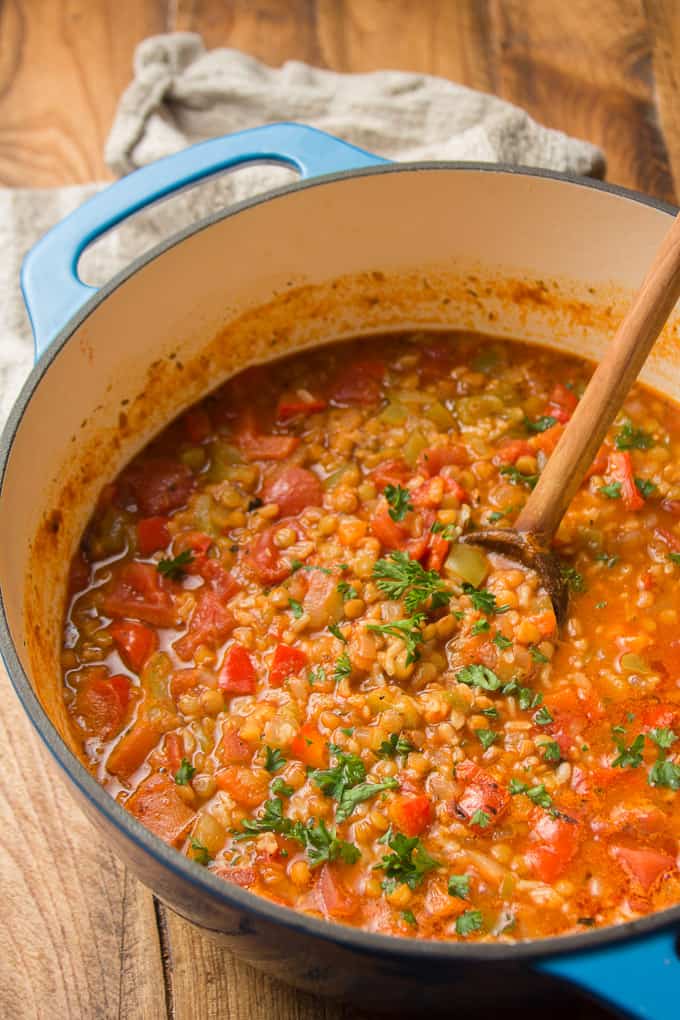 Pot of Vegan Stuffed Pepper Soup with Wooden Spoon
