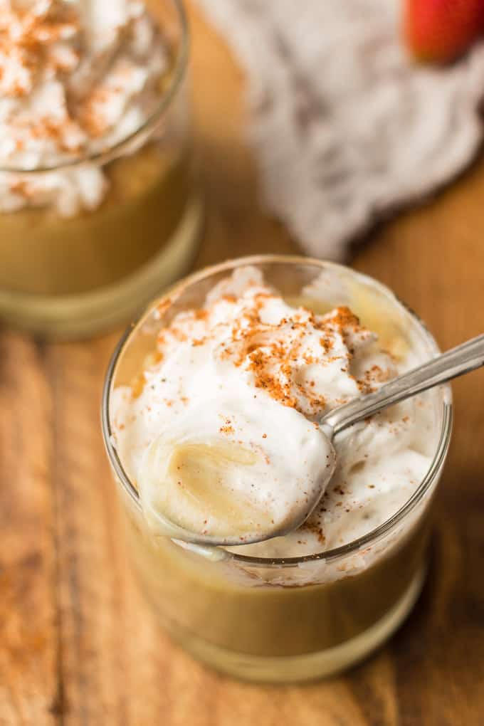 Jar of Vegan Butterscotch Pudding with Spoonful Being Scooped Out