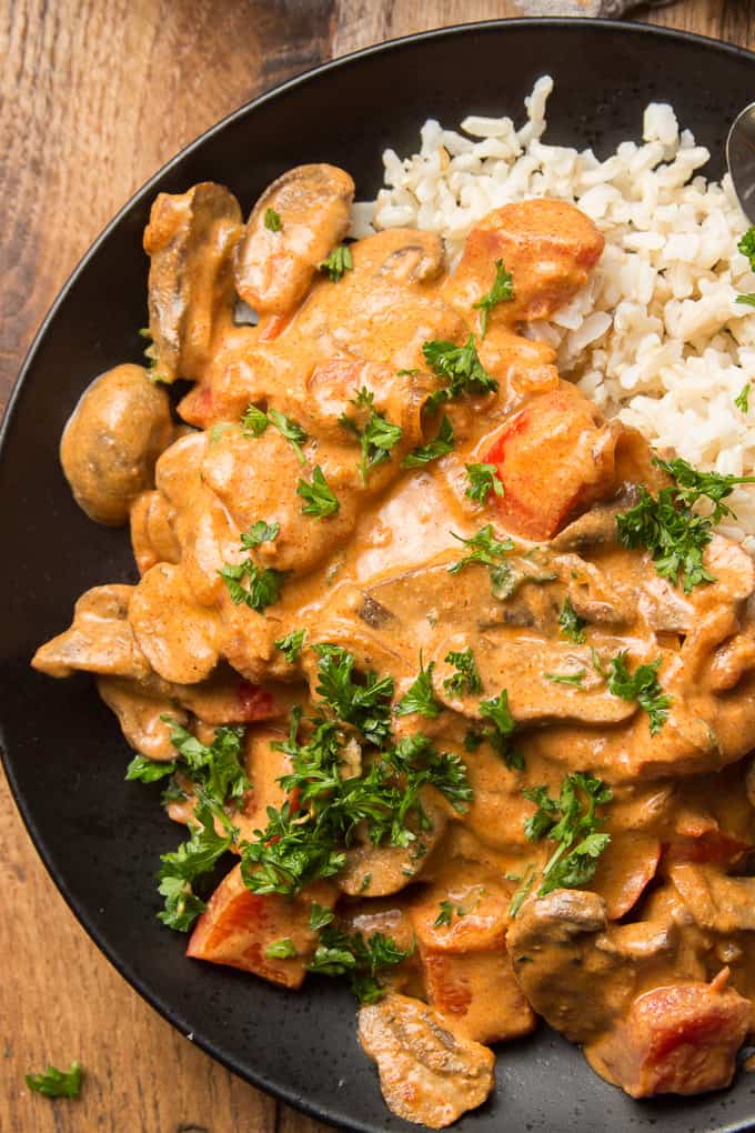 Close Up of Vegan Mushroom Paprikash and Rice on a Plate
