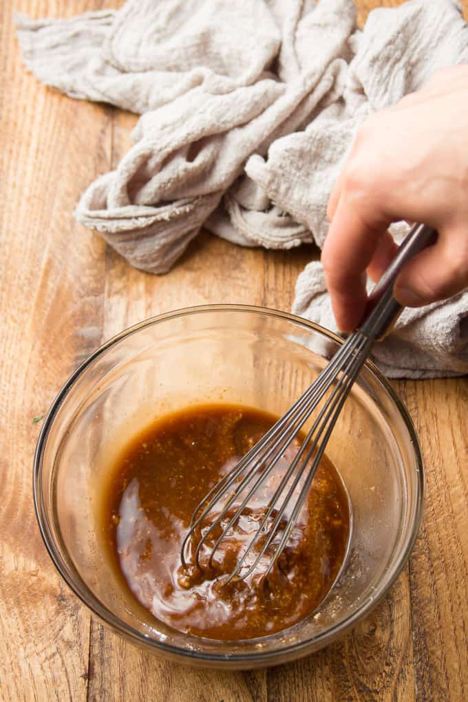 Hand Whisking Stir-Fry Sauce Together in a Bowl