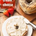 Bagel Half Topped with Vegan Cream Cheese with Text Overlay Reading "Vegan Cream Cheese"