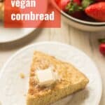 Slice of Vegan Cornbread on a Plate with Text Overlay Reading "Vegan Cornbread"