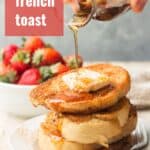 Hand Pouring Maple Syrup Over a Stack of Vegan French Toast with Text Overlay Reading "Vegan French Toast"