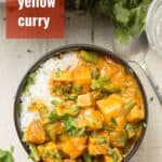 Bowl of Yellow Curry with Text Overlay Reading "Yellow Curry"