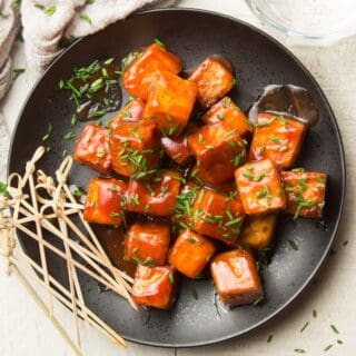 Plate of BBQ Tofu with Skewers on the Side