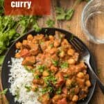 Plate of Eggplant Curry and Rice with Text Overlay Reading "Eggplant Curry"