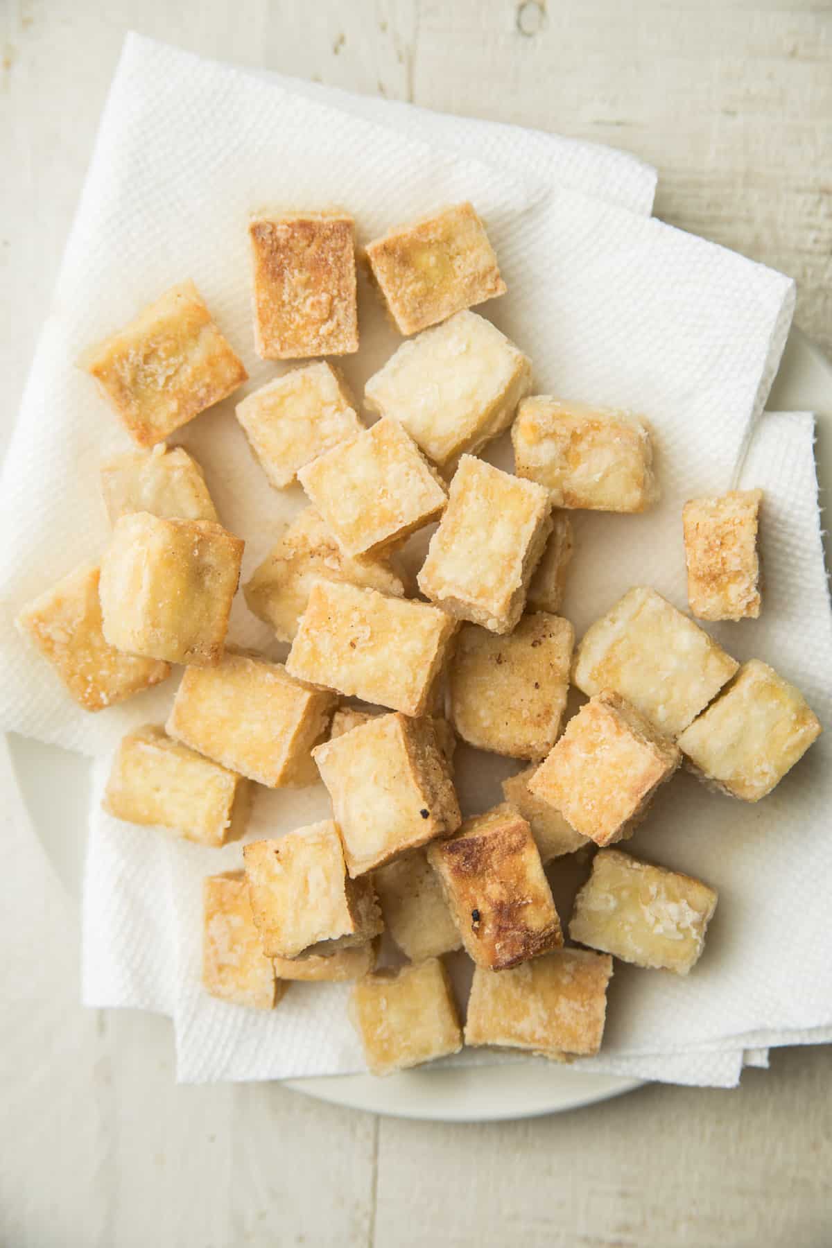 Fried Tofu on a Paper Towel-Lined Plate