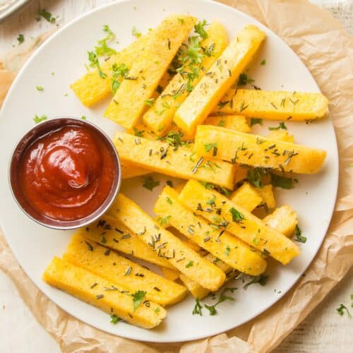 Plate of Herbed Polenta Fries with Ketchup on the Side