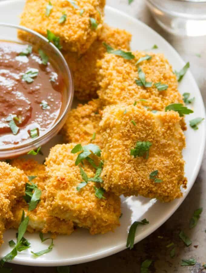 Crispy Baked Tofu Nuggets on a Plate with Dipping Sauce