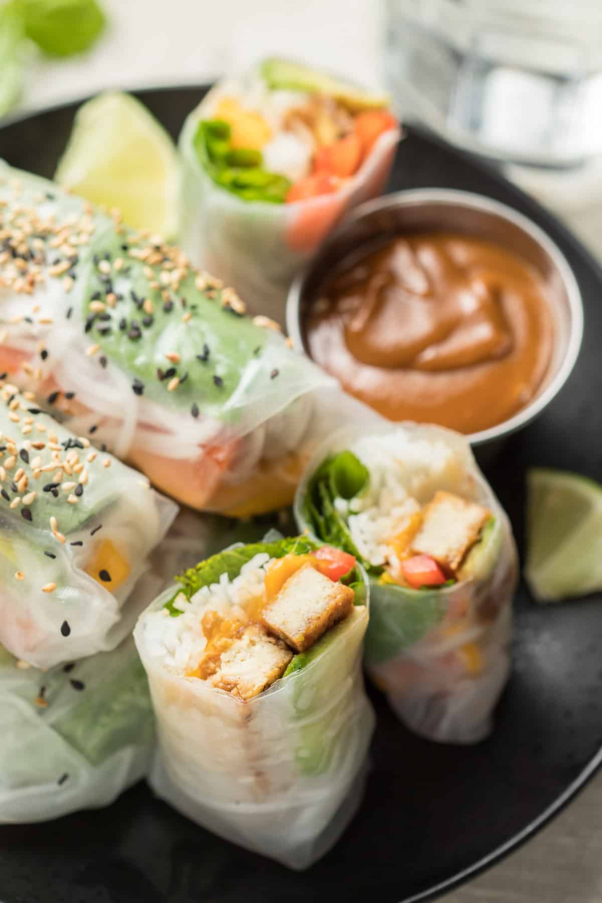 Close Up of Vegan Summer Rolls and Peanut Sauce on a Plate
