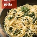 Creamy Kale Pasta in a Skillet with Text Overlay Reading "Creamy Kale Pasta"