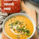 Bowl of Soup with Text Overlay Reading "Vegan Butternut Squash Soup"