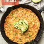 Vegan Frittata in a Skillet with Avocado Slices on top with text overlay reading "Vegan Frittata".