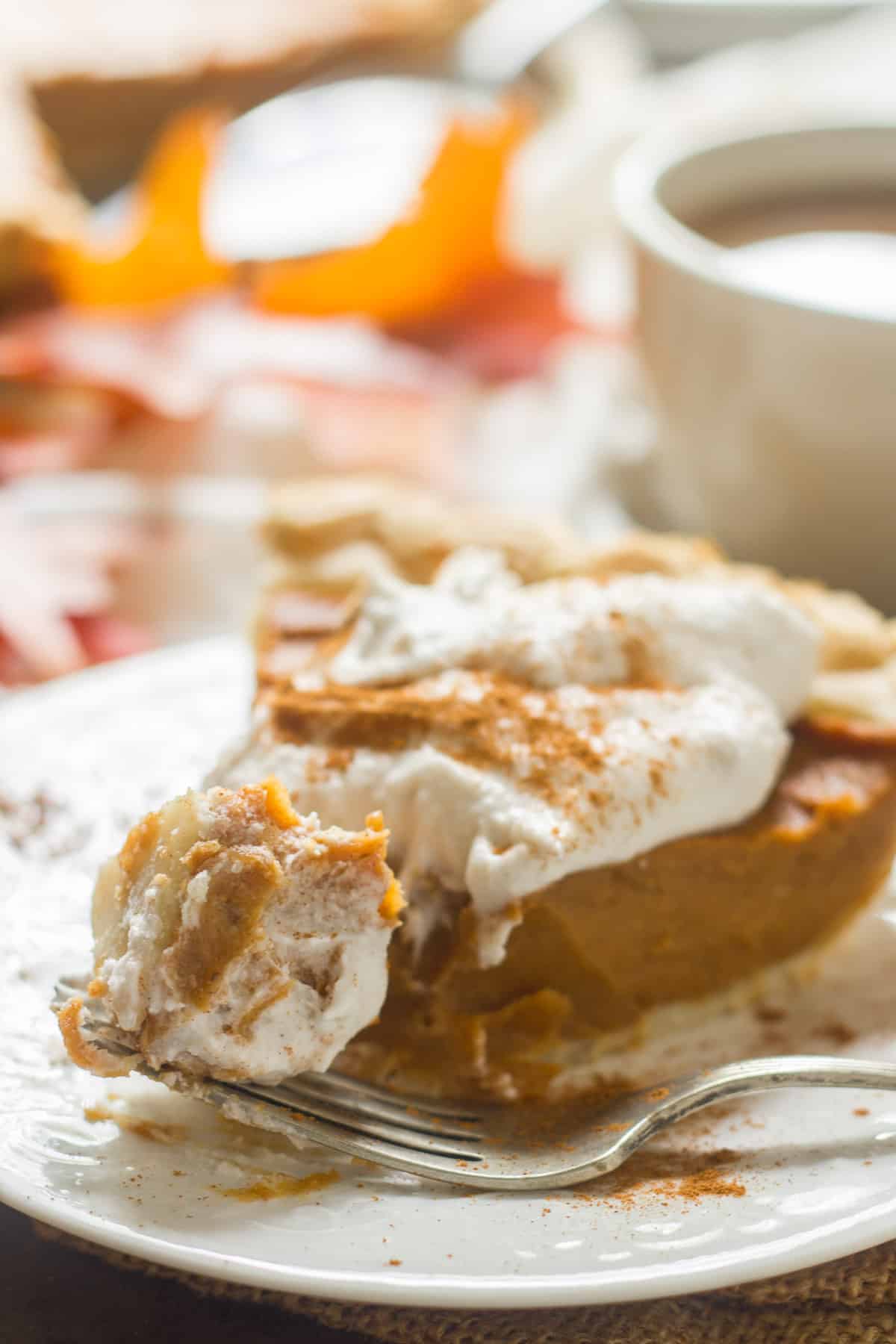 Close up of a bite of Vegan Sweet Potato Pie on a fork.