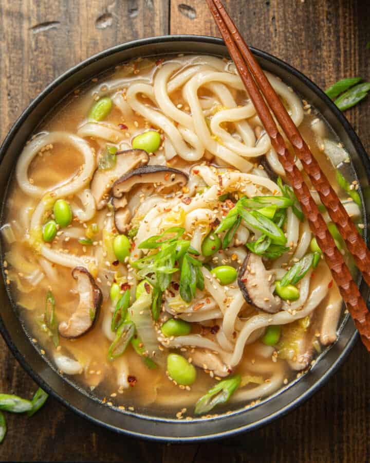 Bowl of Udon Noodle Soup with chopsticks.