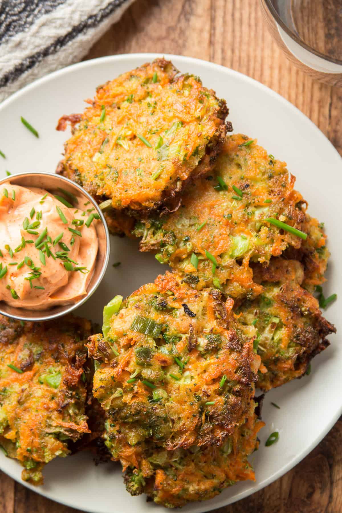 Vegetable Fritters on a plate with a dish of chipotle mayo.