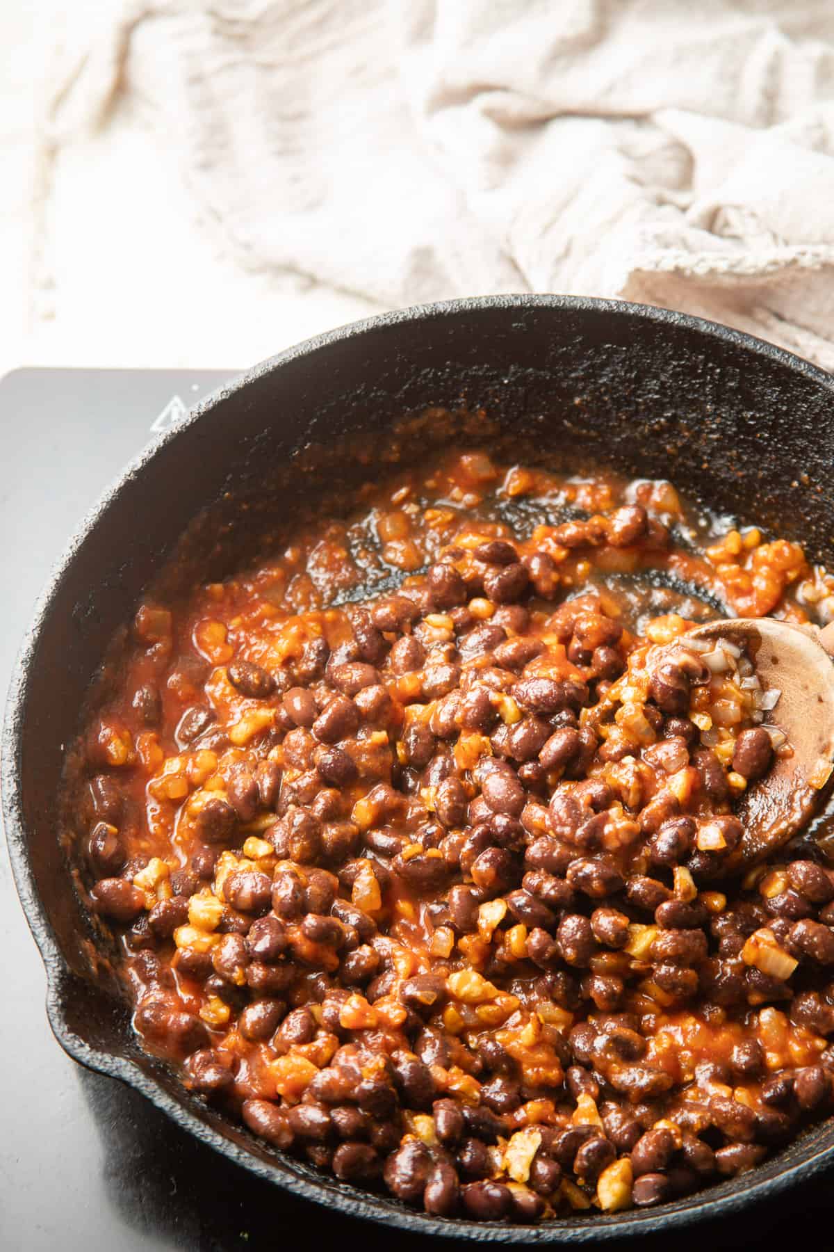 Black bean and walnut taco filling simmering in a skillet.