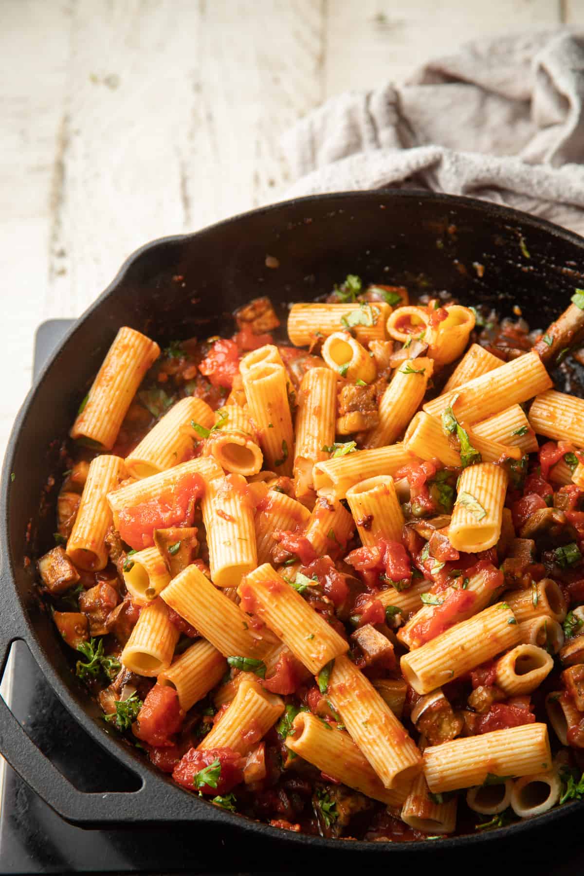 Eggplant Pasta cooking in a skillet.