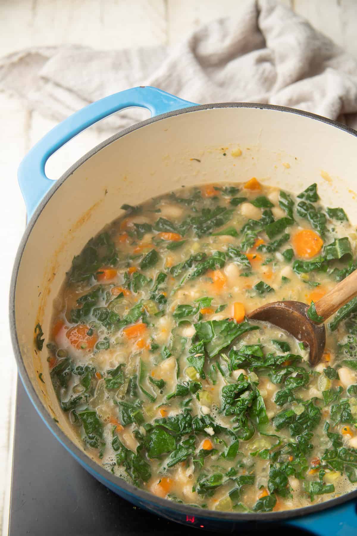 Tuscan Kale Soup simmering on the stove.