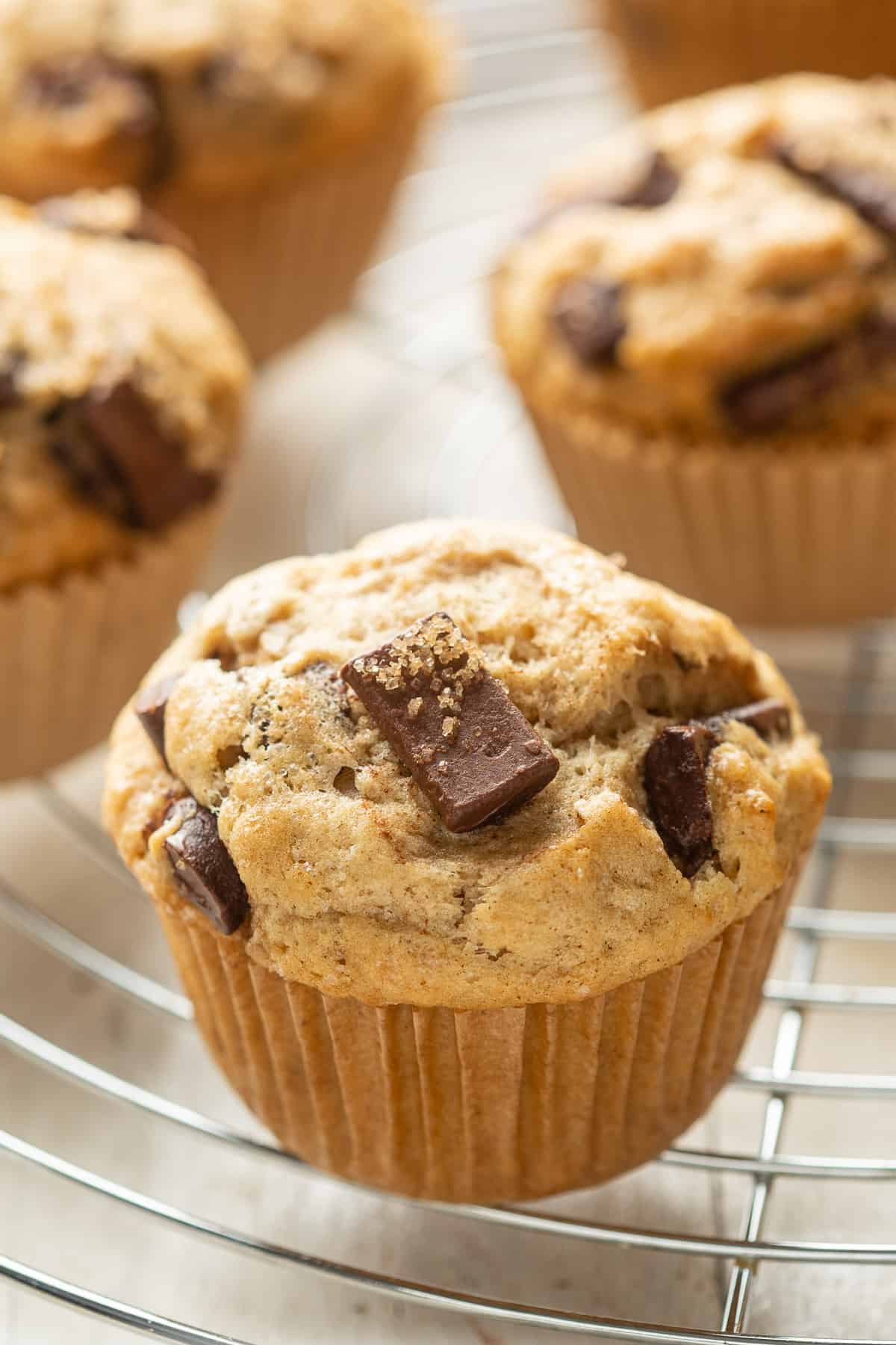 Vegan Chocolate Chip Muffins on a cooling rack.