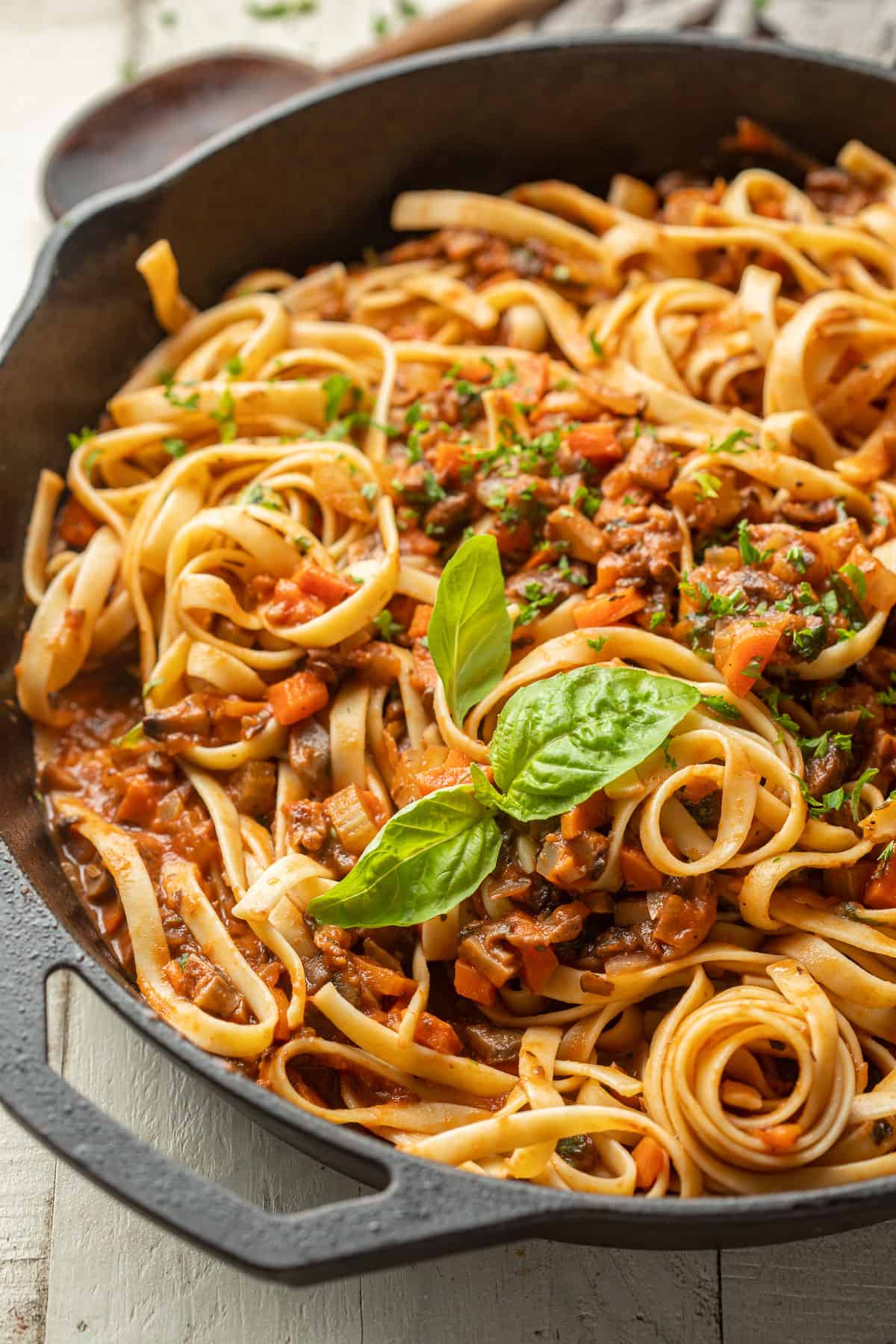 Close up of pasta with Mushroom Bolognese in a skillet.