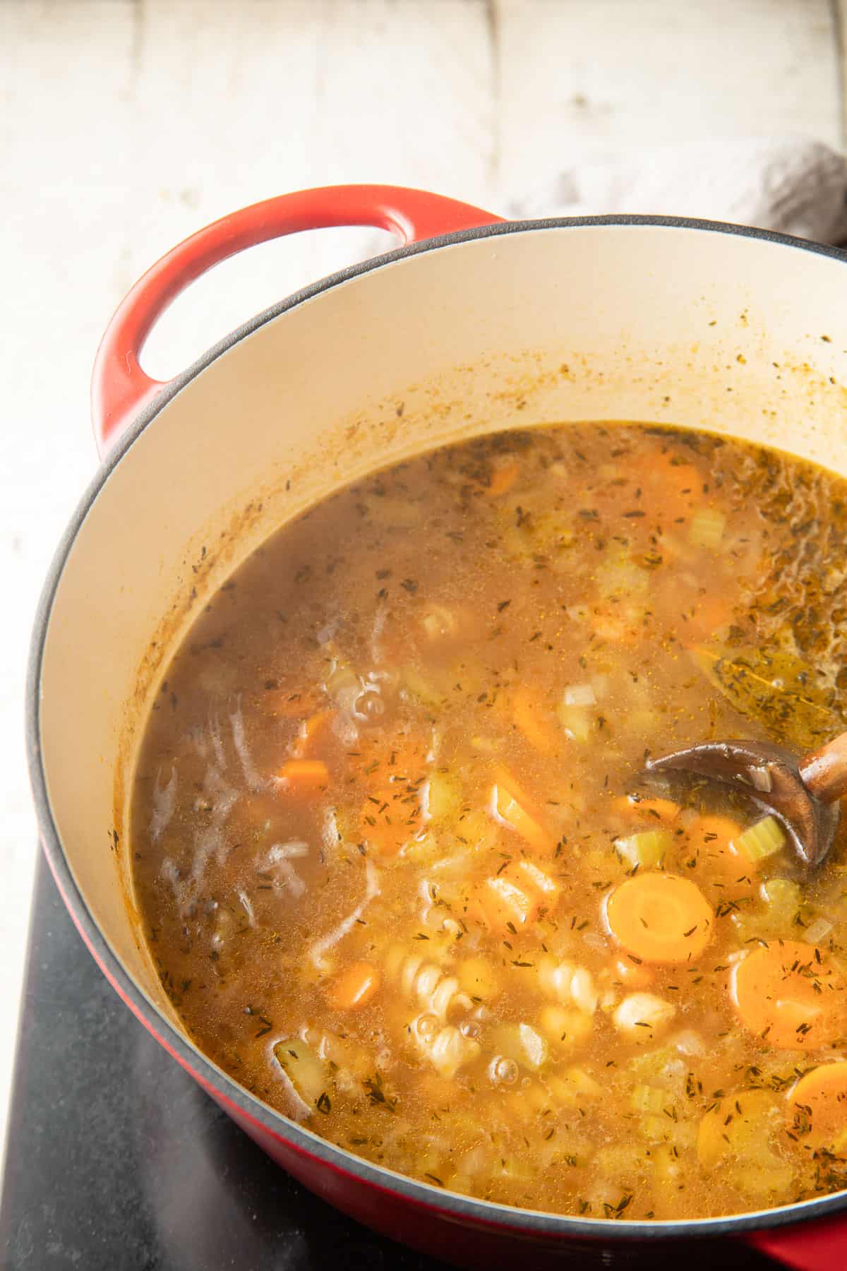 Chickpea Noodle Soup simmering in a pot.