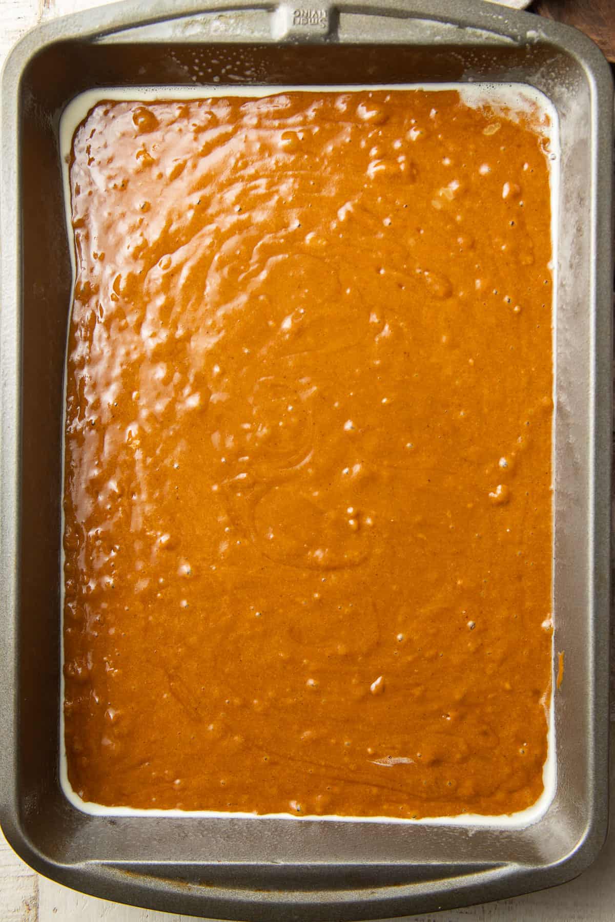 Vegan Gingerbread Cake batter in a baking pan.
