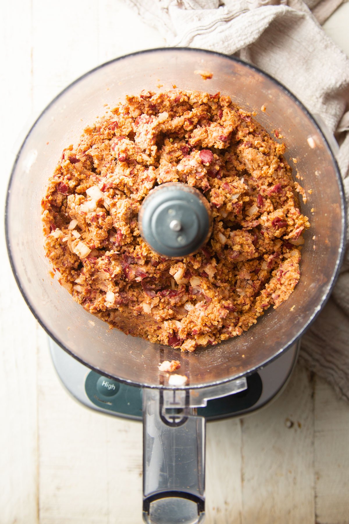 In the bowl of a food processor, combine the mixture to make the red bean vegan meatballs.