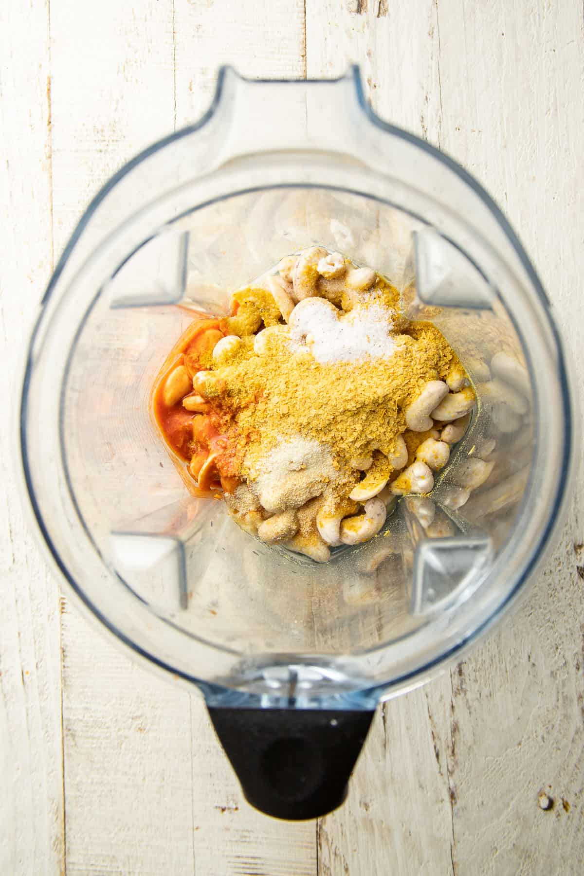 Cashew queso ingredients in a blender before blending.