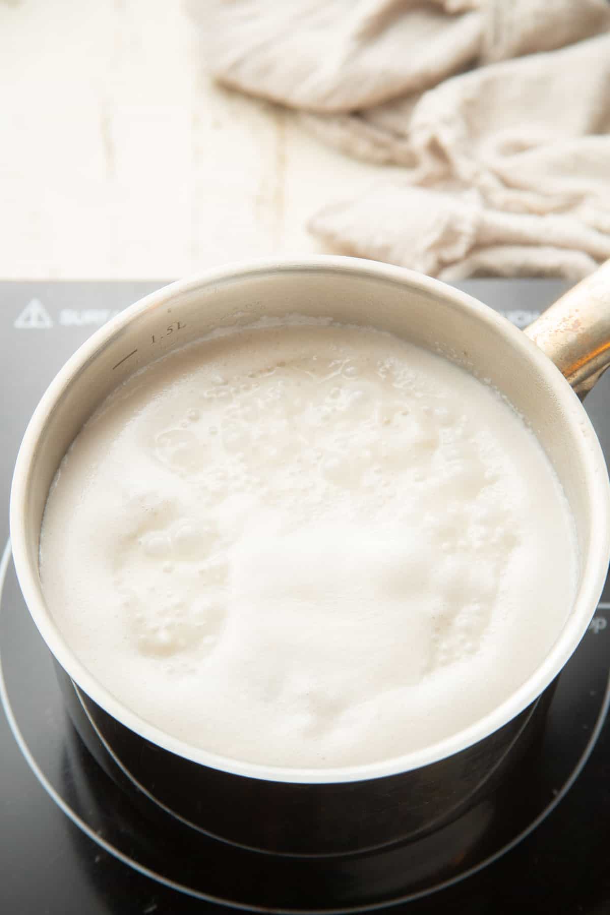 Tapioca pearls simmering in non-dairy milk.