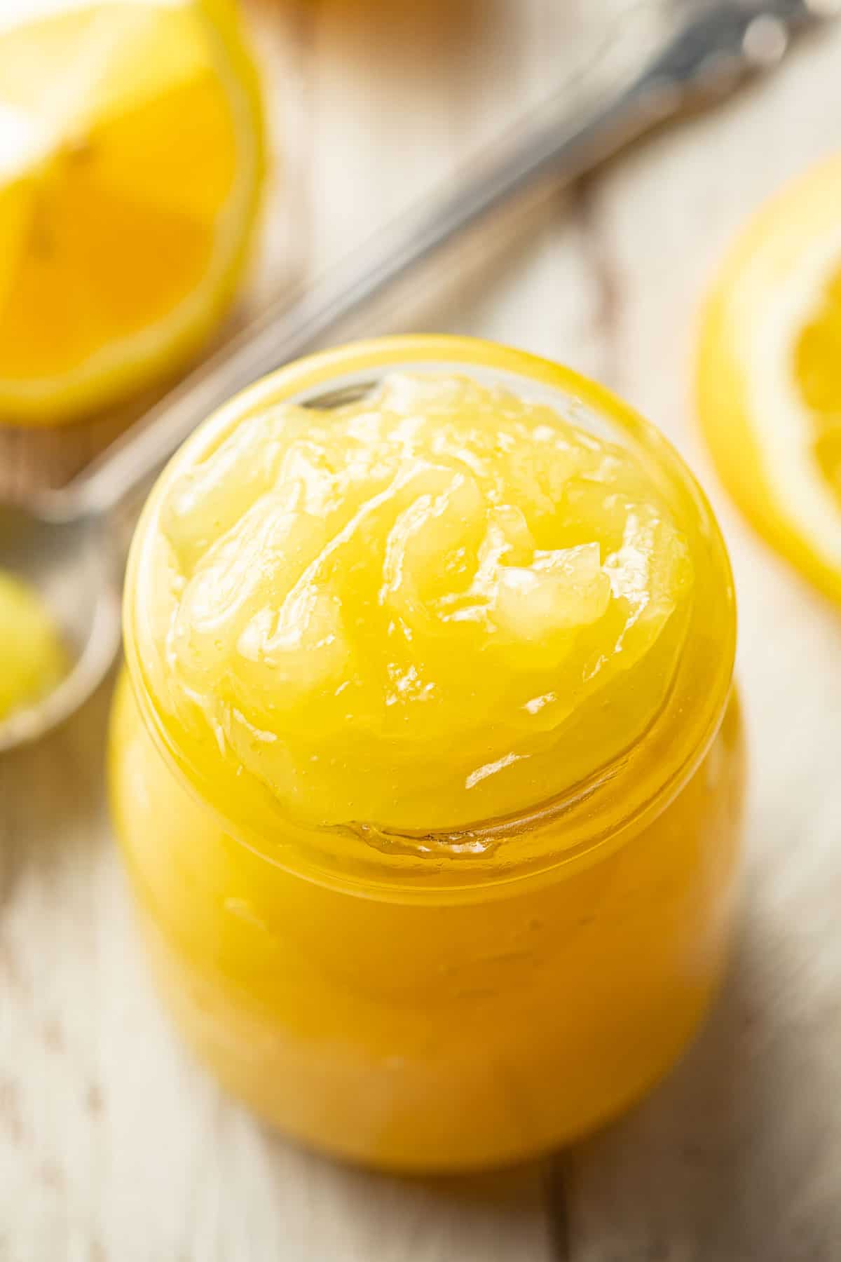 This vegan lemon curd is thick, rich, and bursting with tangy lemon flavor! It's easy to make with just 7 ingredients and perfect for slathering on toast, spreading on scones or stuffing a pie!