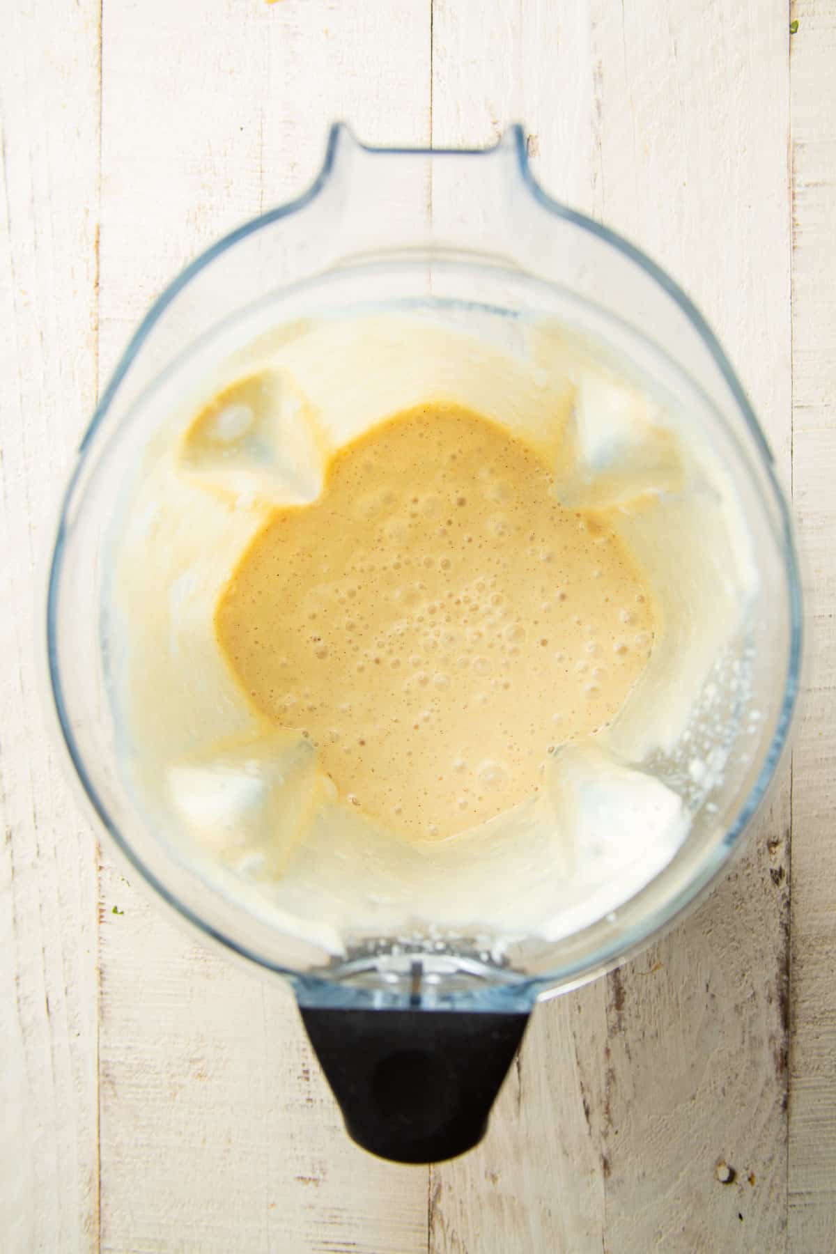 Uncooked banana pudding mixture in a blender.