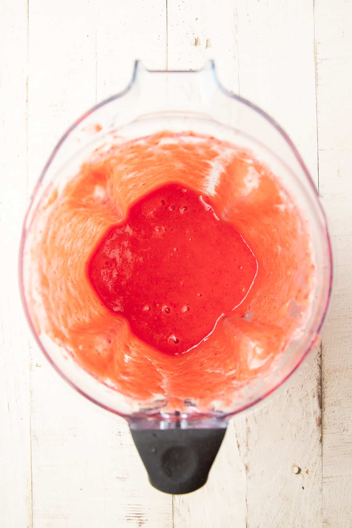 Strawberry puree in a blender.