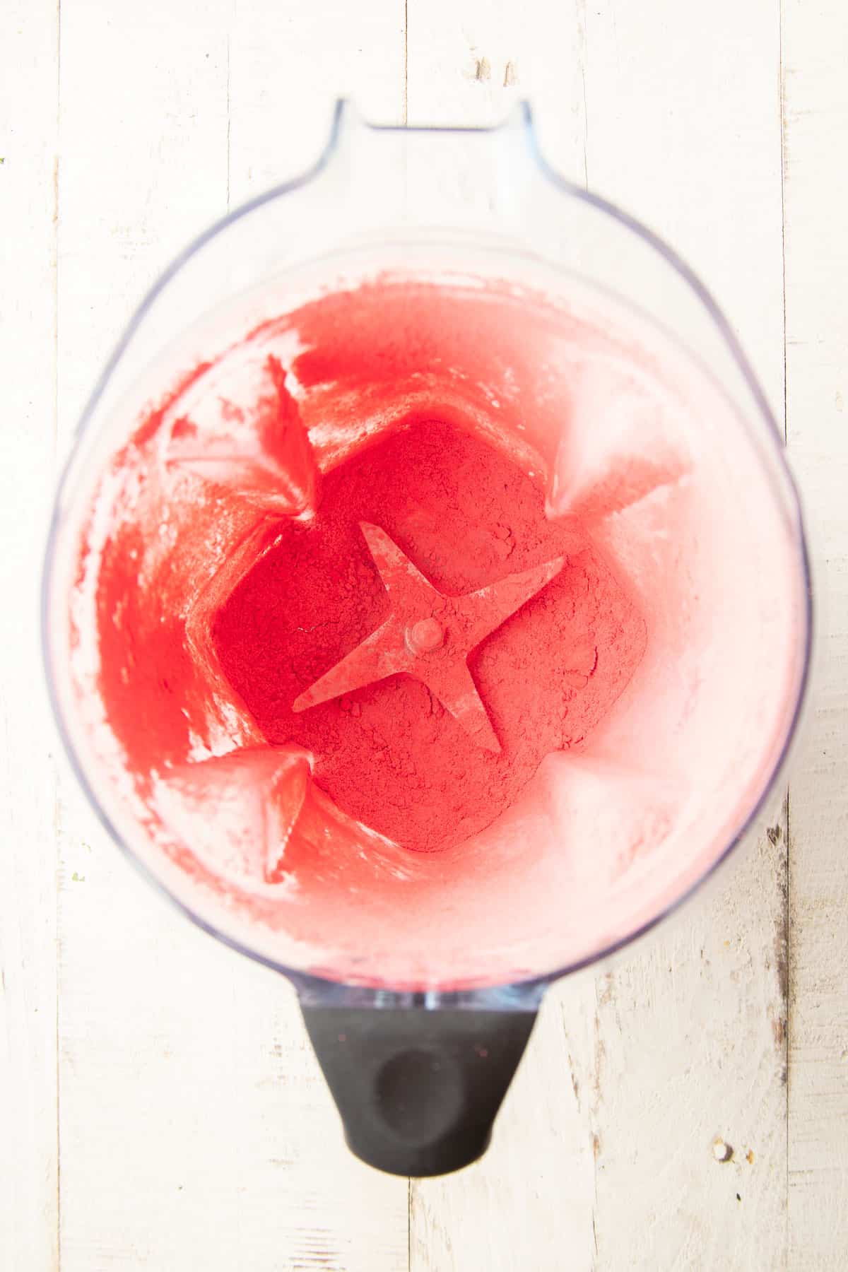 Powdered freeze dried strawberries in a blender.