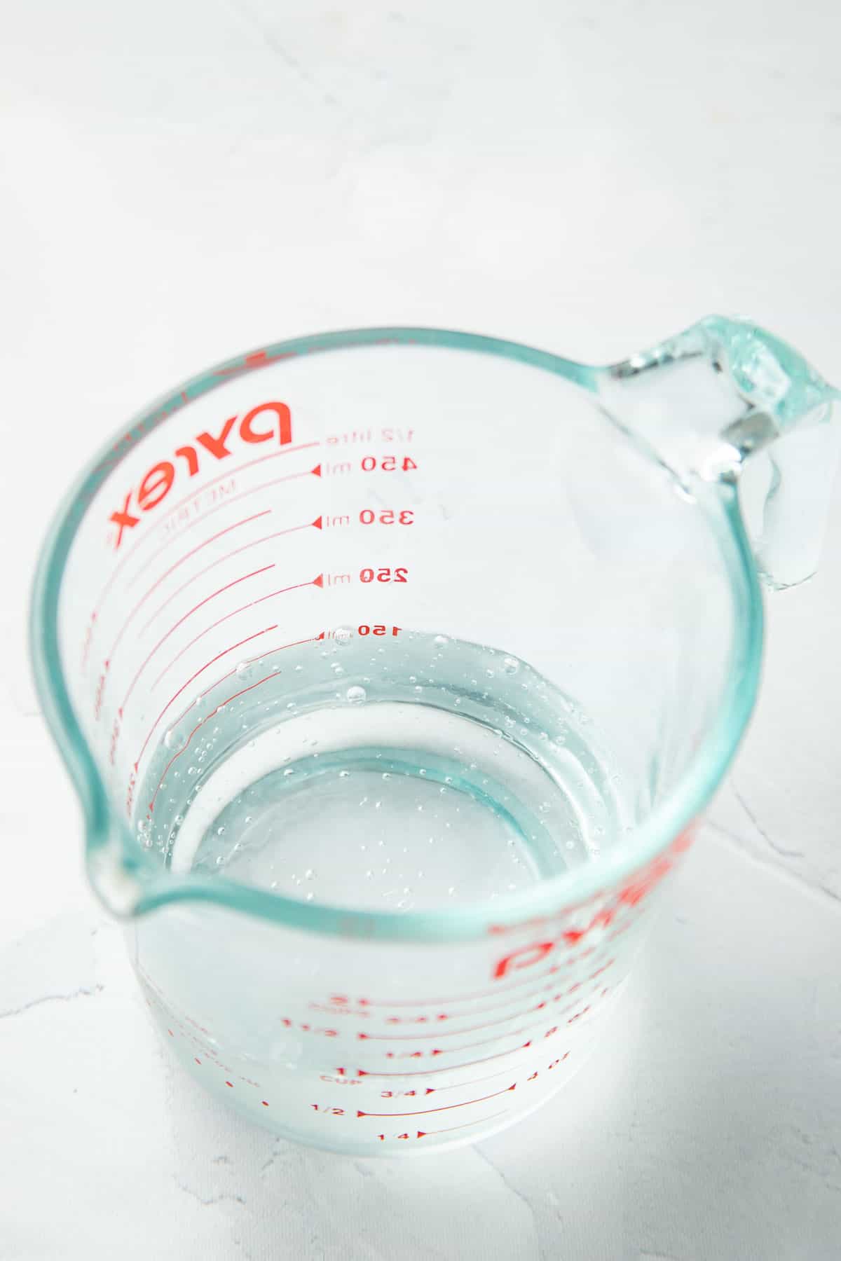 Seltzer water in a liquid measuring cup.