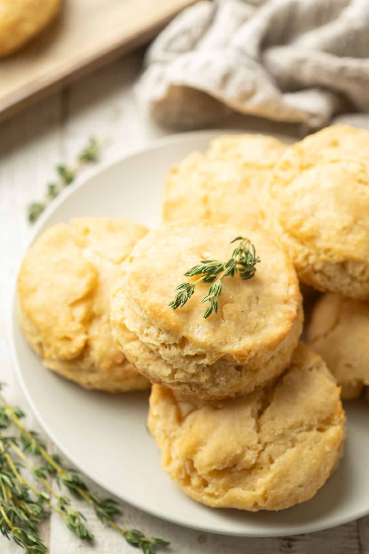Place of Vegan Biscuits with a sprig of thyme on top.